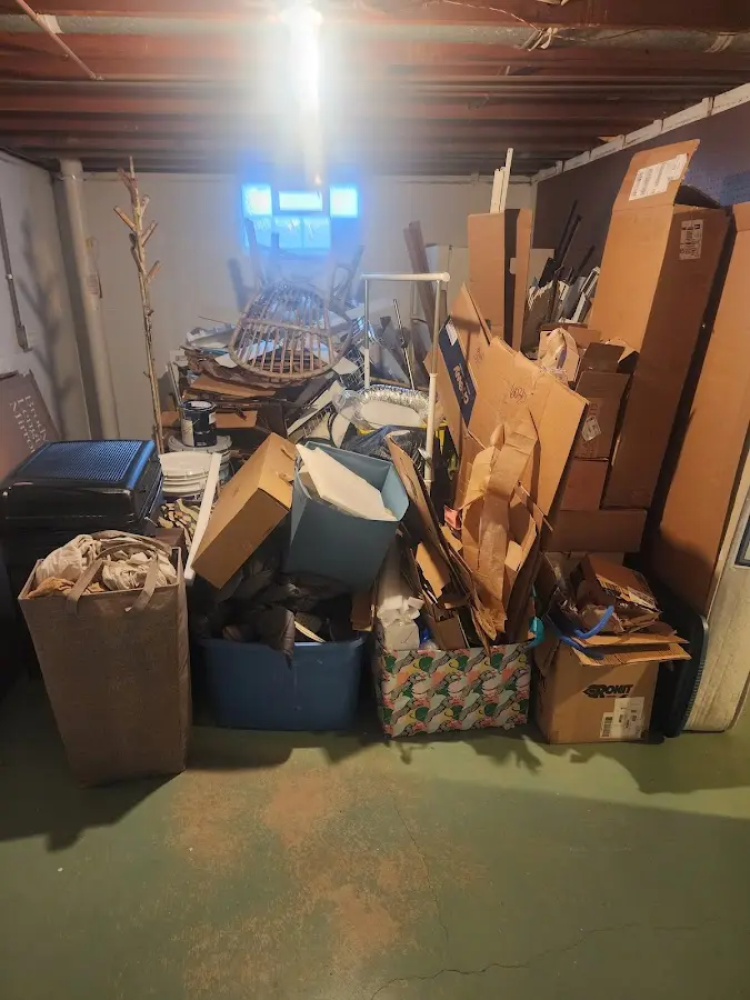 Roll-off dumpster container at job site for 4 Yard Dumpster Rental in Pinewood